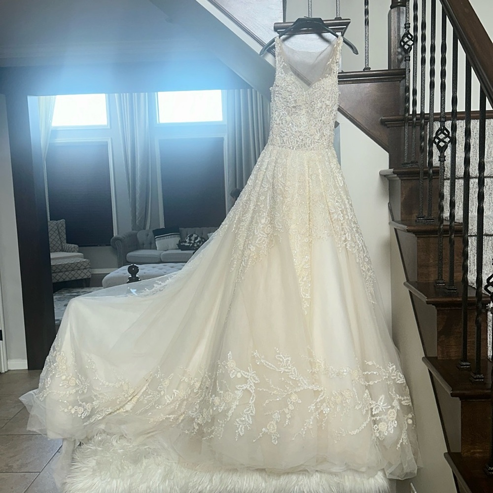 Stunning designer wedding dress size 2
